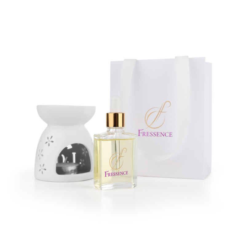 Frescence diffuser and bottle with packaging on a white background